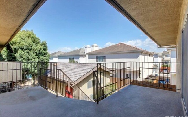 Patio Area is to the left of shared walkway - 2502 Manhattan Beach Blvd