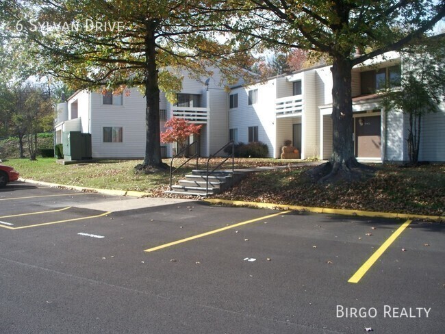 Building Photo - Warm up next to the fire in this 2 bedroom...