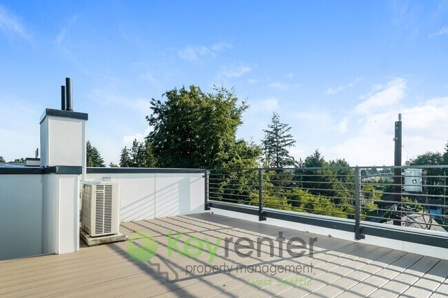 Building Photo - Skyline Chic: Modern Living with a Rooftop...