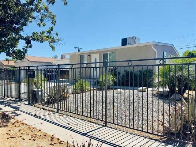 Building Photo - 8657 Ranchito Ave