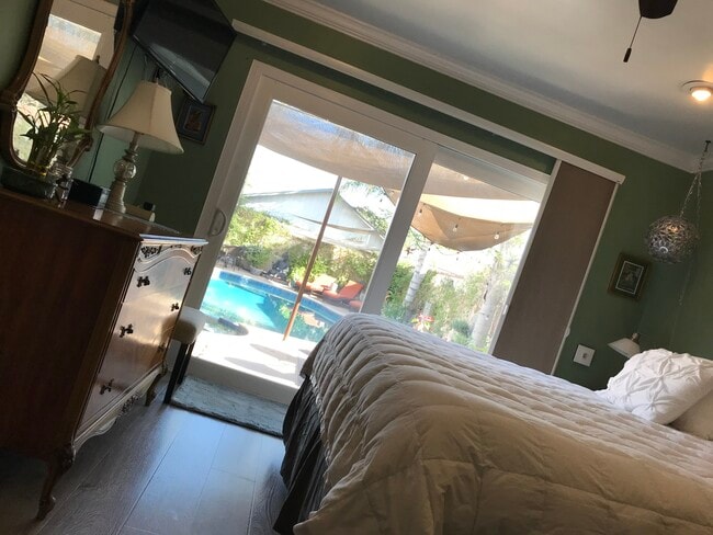 View from master bedroom with California King Size Bed. - 3822 Berryman Ave