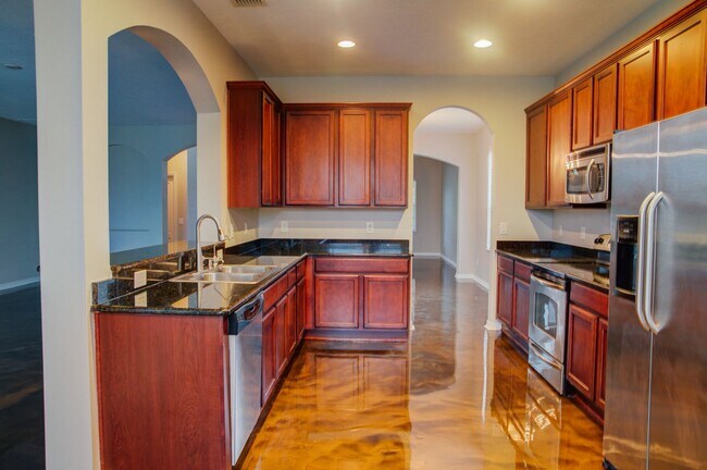 Building Photo - Elegant 5-Bedroom Pool Home with 3-Car Gar...