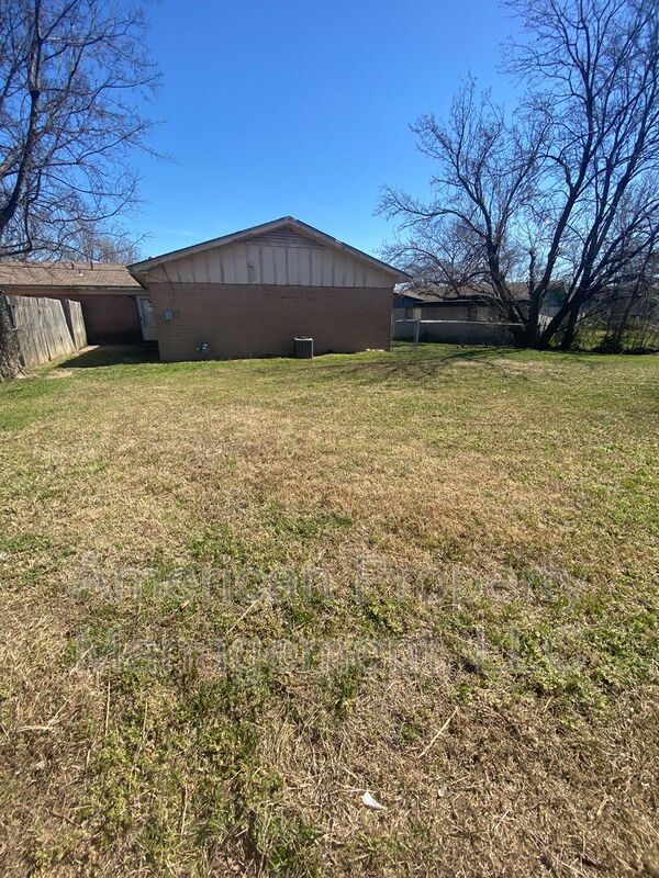 Building Photo - 1598 S 67th E Ave