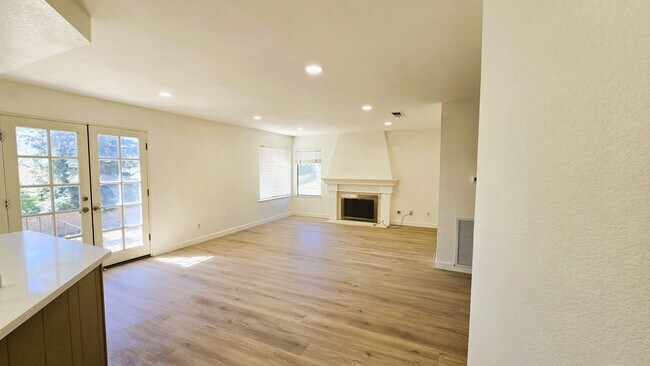Building Photo - "Spacious, Sunlit Home in a Peaceful Ranch...
