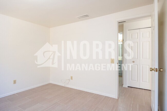 Building Photo - Cozy Home with No HOA and a Large NO Maintenance Backyard