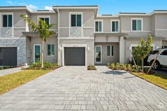 Building Photo - Experience upscale living in this stunning...