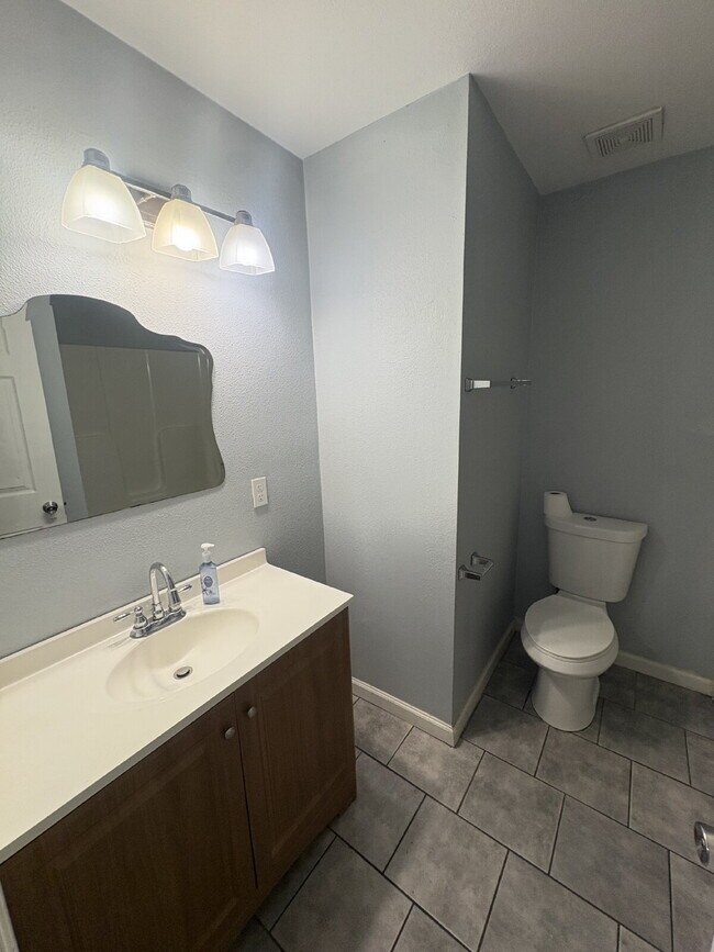Building Photo - Open floor plan, four-bedroom two-bathroom with washer and dryer