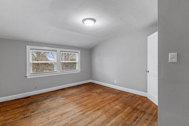 Building Photo - Brick home, Two Story, Hardwoods, DR, 2 Sun Rooms, FP, Carport!.