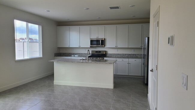 Building Photo - COMING SOON! Gorgeous NEW Sparks home! LOO...