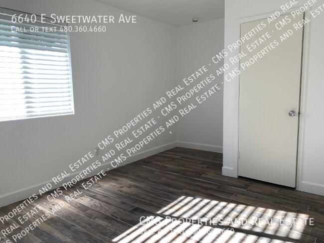 Building Photo - 6640 E Sweetwater Ave