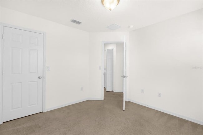 Building Photo - 8130 Red Stopper Ln