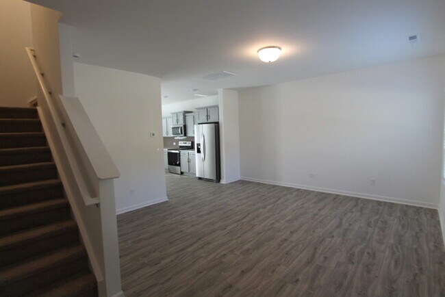 Building Photo - NEW 3 Bedroom Townhome Minutes from Downto...