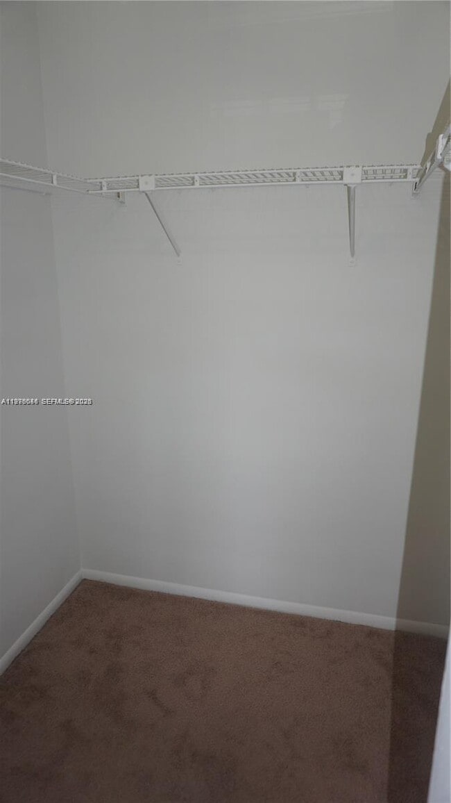 Building Photo - 10057 Winding Lake Rd