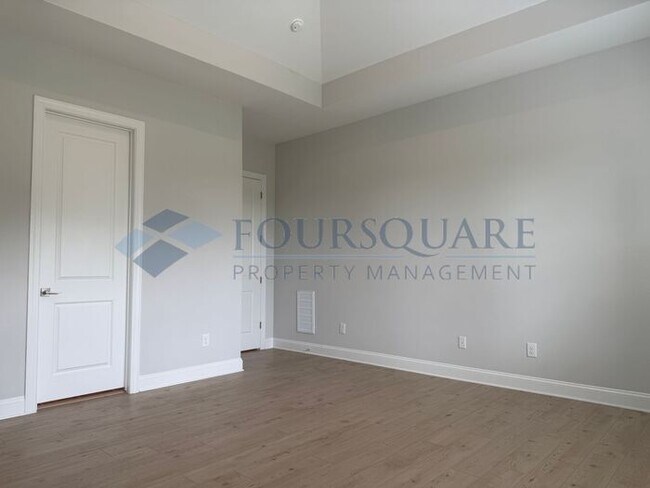 Building Photo - Elegant 4-Bed / 3.5-Bath Home with Main-Level Primary Suite, Quartz Kitchen & 3-Car Garage – In H...
