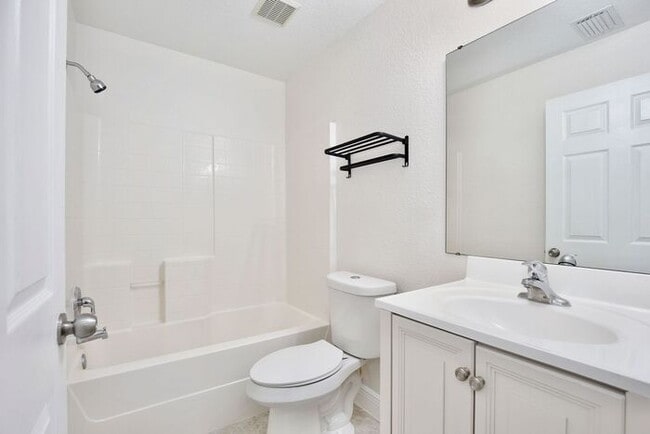 Building Photo - Beautiful 3/2 Spacious Home with a covered patio and a 2 Car Garage in Villa Homes Village - St C...