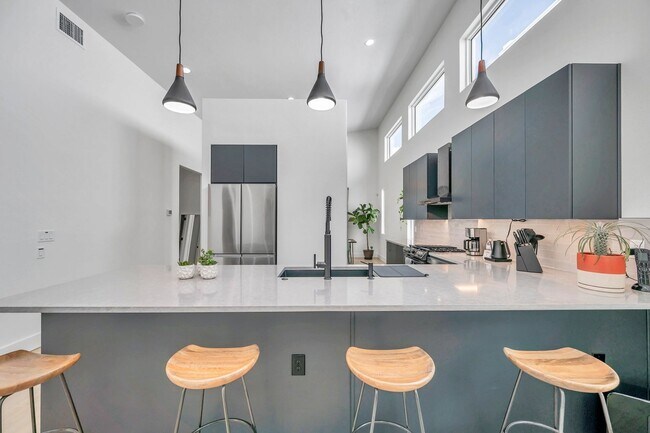 Building Photo - Luxury Living in Grand Central District: Exquisite Furnished Home with Pool