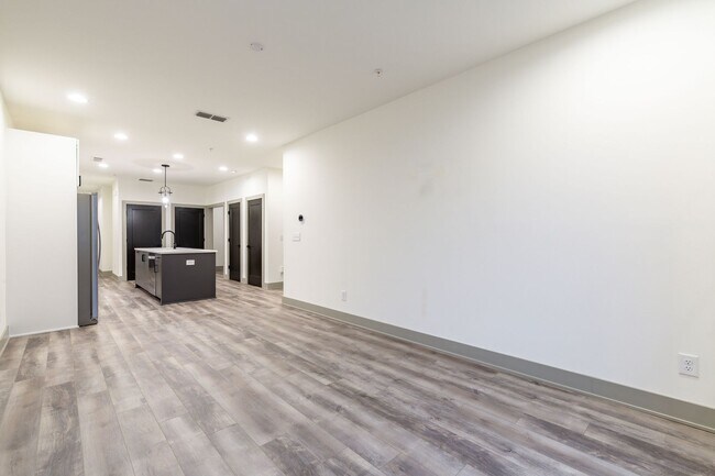 Building Photo - Modern Living Meets Walkable City Charm in...