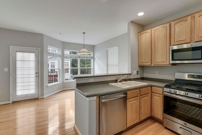 Building Photo - COMING SOON - Great 4 level end unit TH in...