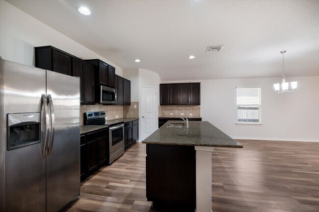 Building Photo - Stylish Home with LVP Flooring, Granite Counters & Appliances Included
