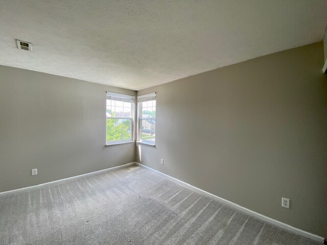 Building Photo - Welcome home to this stunning 3-bedroom, 2.5-bath residence in the desirable Meridian Place neigh...