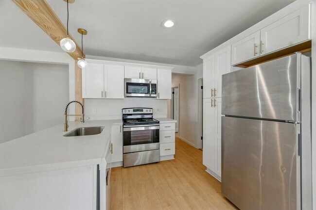 Building Photo - Remodeled 3 Bed/2 Bath Home with Bonus Upper Room Near Booming 9 Mile Rd Hub