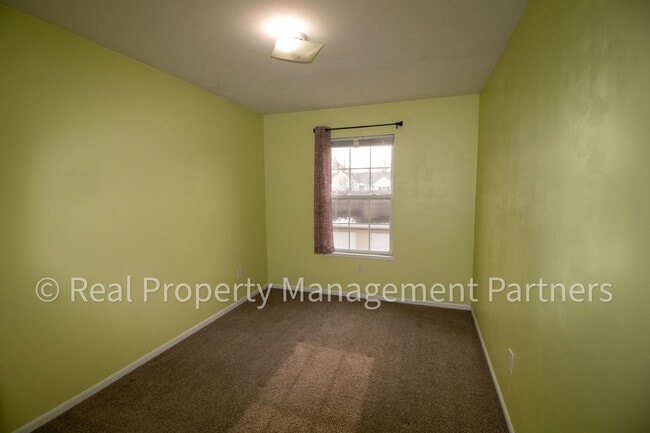 Building Photo - Forest Hills 3 Bed Townhome with Garage, Pond View and Some Utilities Included