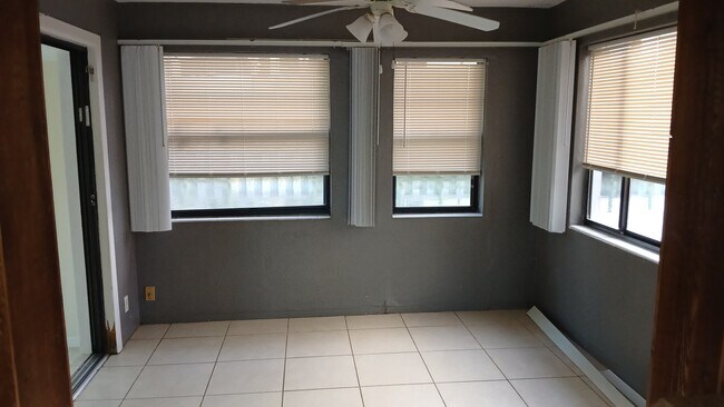 Dining room Canal view - 211 Sandy Cir