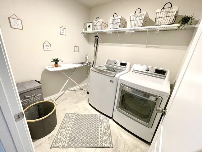 Laundry room with upgraded appliances - 9451 Avery Lilac Ln