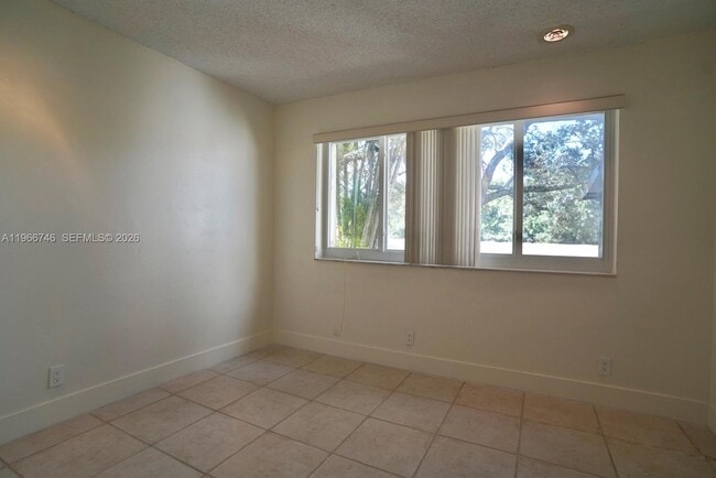 Building Photo - 6555 NW 99th Ave