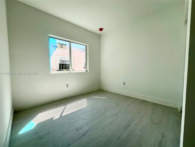 Building Photo - 6820 NW 6th Ct