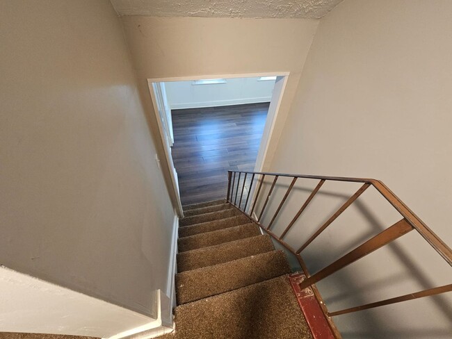 Building Photo - Spacious 4-Bedroom Cleveland Home with Updated Flooring & 2-Car Garage