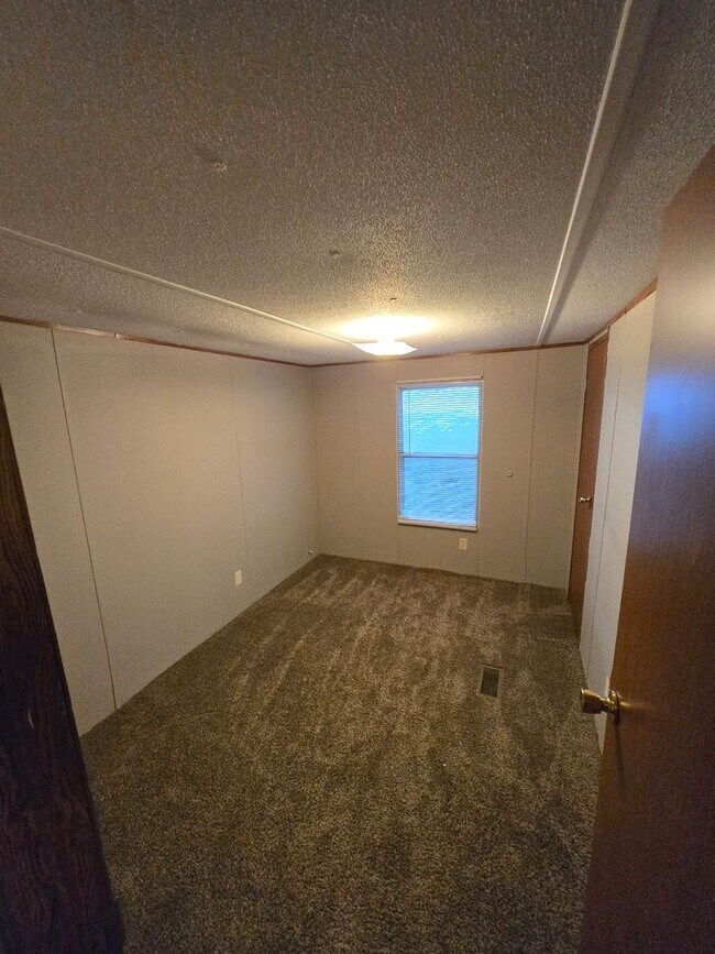 Building Photo - 3 Bed 2 Bath Mobile Home for rent in Middletown, MO!