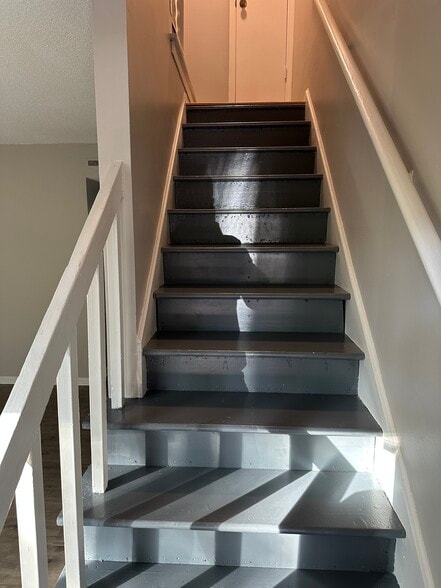Entryway leading upstairs to bedrooms - 815 Raleigh St