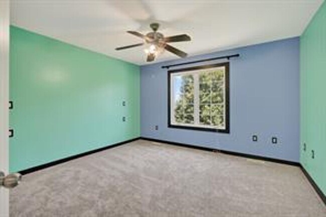 Building Photo - Spacious 5-Bed Walkout Home with Over 3,50...