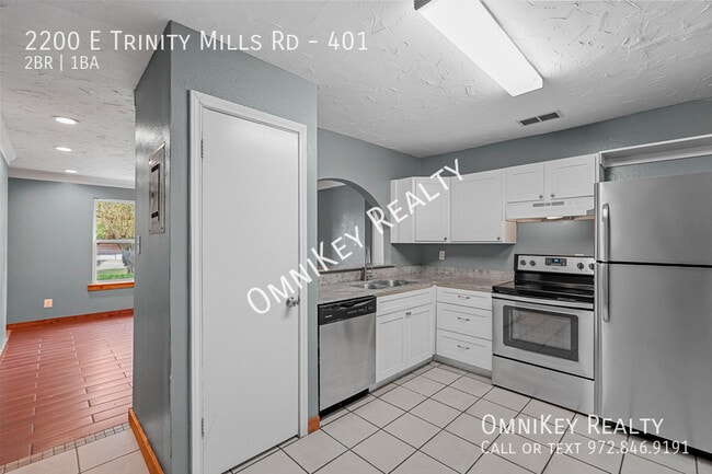 Building Photo - 2200 E Trinity Mls Rd