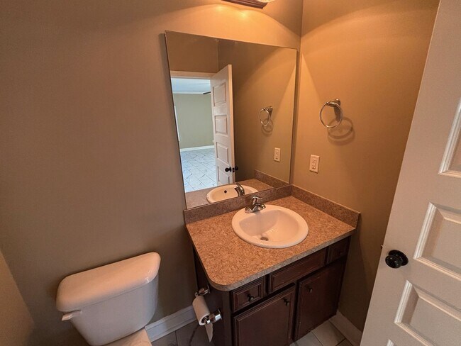 Building Photo - This property blends ample living space and storage with functional amenities.