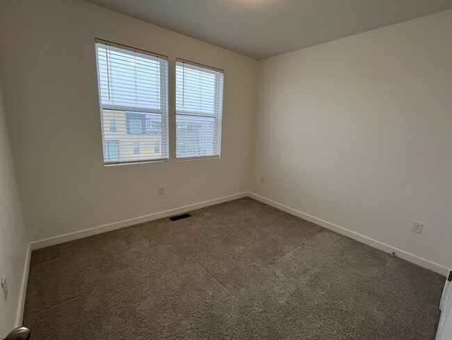 Building Photo - Modern 3-Bedroom Condo in Adventurous Daybreak!