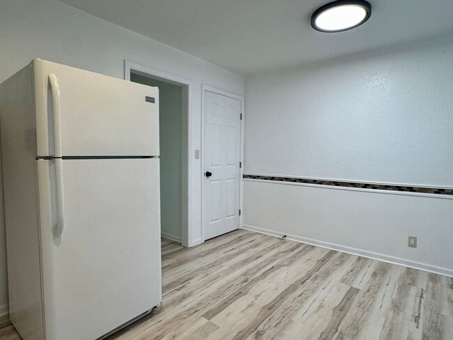 Building Photo - {6617} Move in ready + Updated + Attached Garage