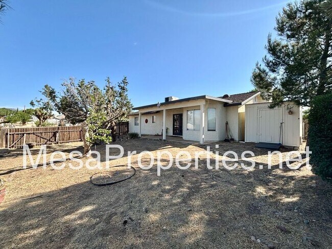 Building Photo - 7891 Corona Ave