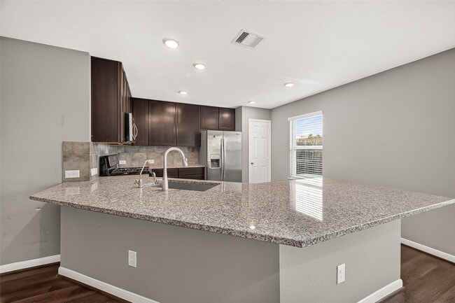 Building Photo - 8932 Hollister Commons Ln