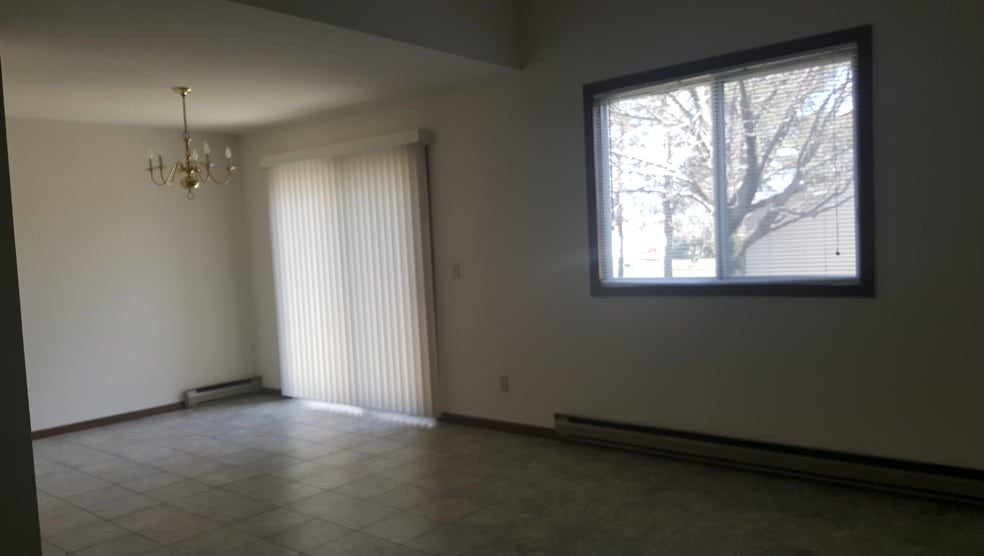 dining and part of living room - 1334 Spring Village Dr