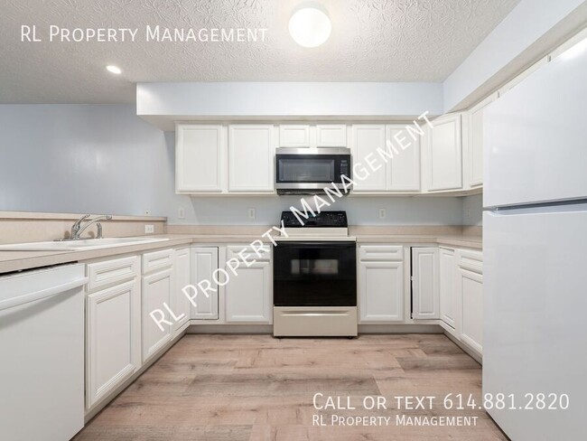 Building Photo - Nice 2 Bedroom/1.5 Bathroom Condo