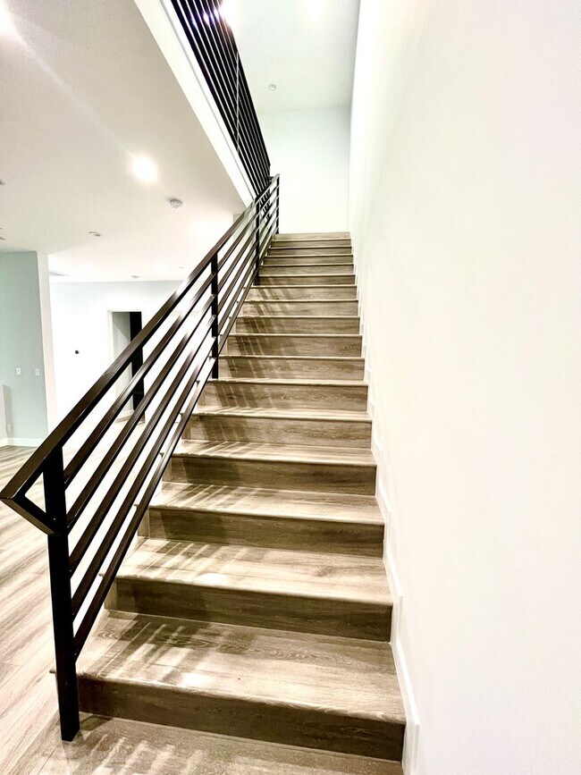 Building Photo - Newly built gated home with top of the lin...