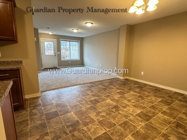 Building Photo - North Brooklyn Park Town Homes, Dedicated Office, 2 Car Garage, Washer/Dryer, Front Patio