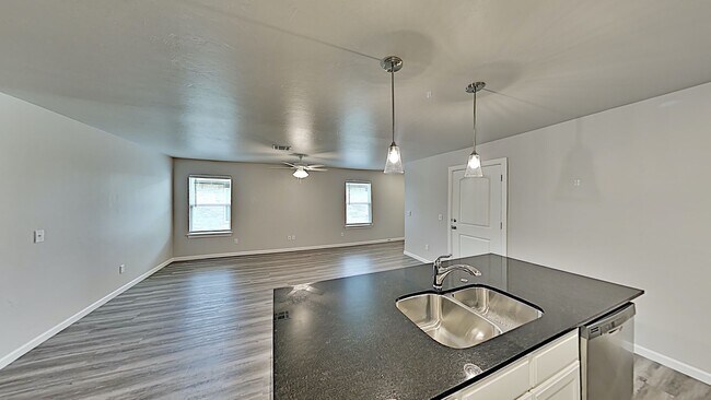 Building Photo - 2 Bedroom 2 Bathroom 2 Car Garage Duplex close to Broadway Extension, a short distance from Edmon...