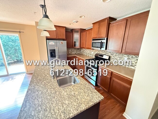 Building Photo - End Unit Townhouse Available Now, Loft Area, Large Primary Suite, Private Side Patio