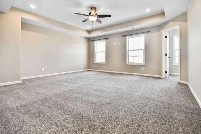 Building Photo - Pet Friendly Three Bedroom with Bonus!