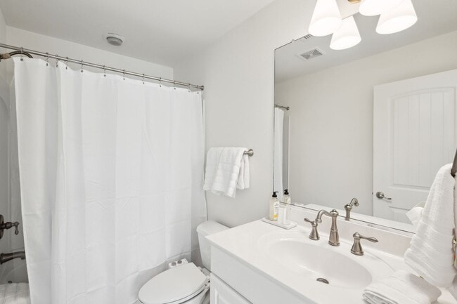 Building Photo - Fully Furnished 2BR Condo with Designer Touches in Shelmore Village