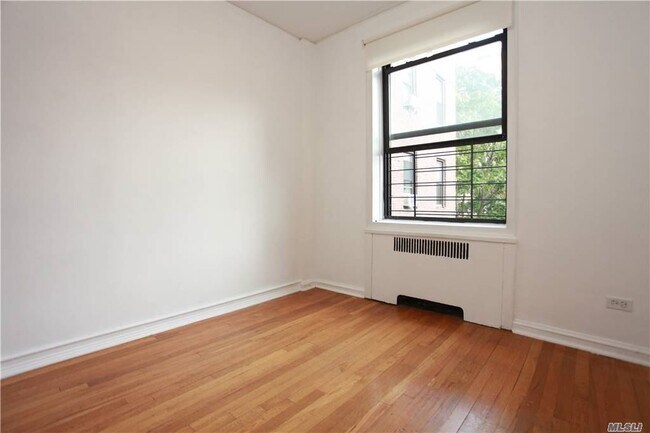 Building Photo - 65-10 99th St