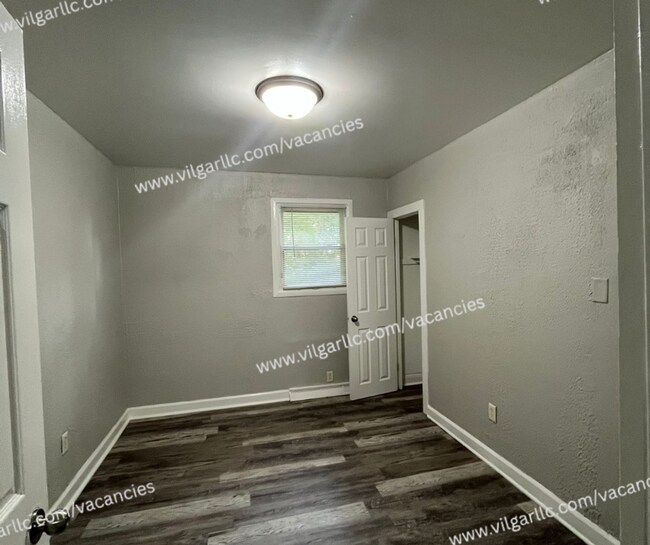 Building Photo - 6065 E 6th Pl
